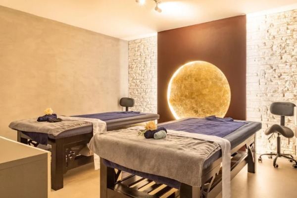 Couples treatment room with two tables side by side